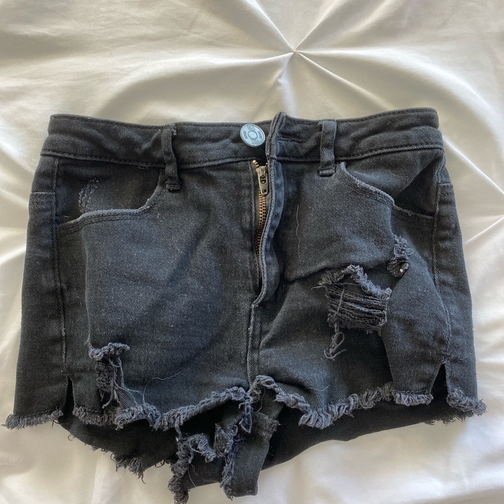 black ripped jean shorts